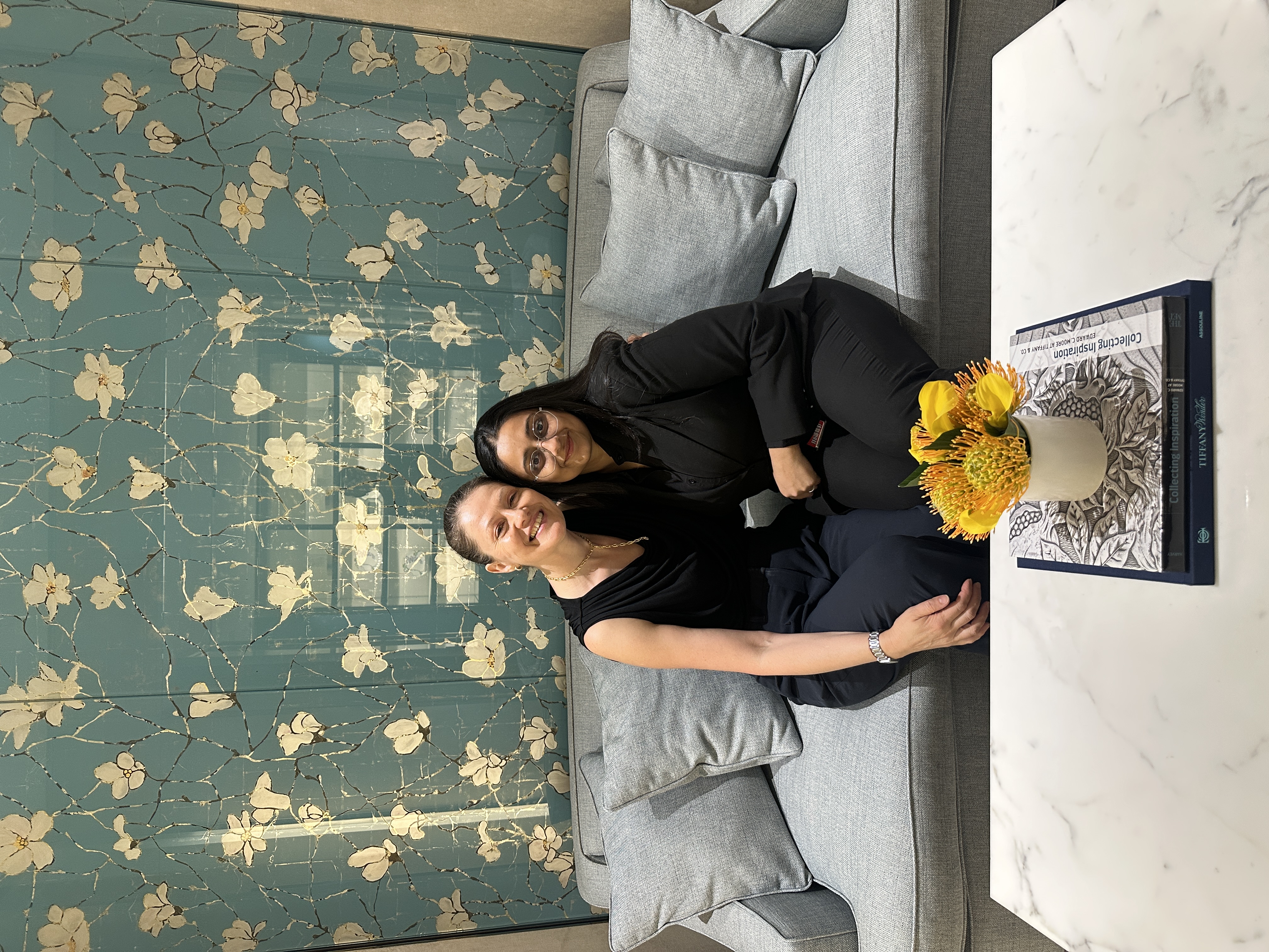 Mahee Thakkar with a Tiffany & Co. team member